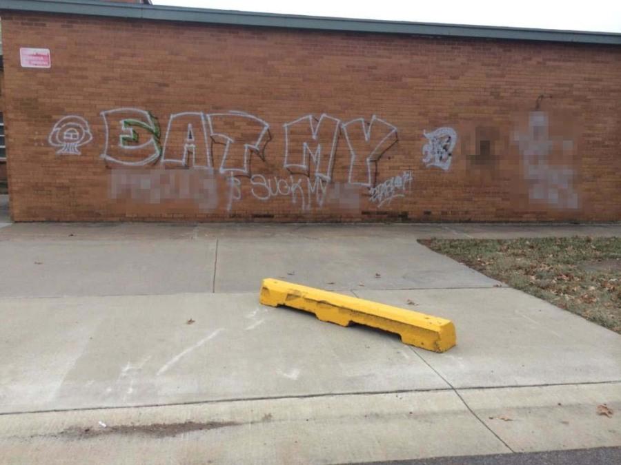 The annex walls were found vandalized Nov. 30. Some offensive words in this picture have been blurred (See below for uncensored picture).