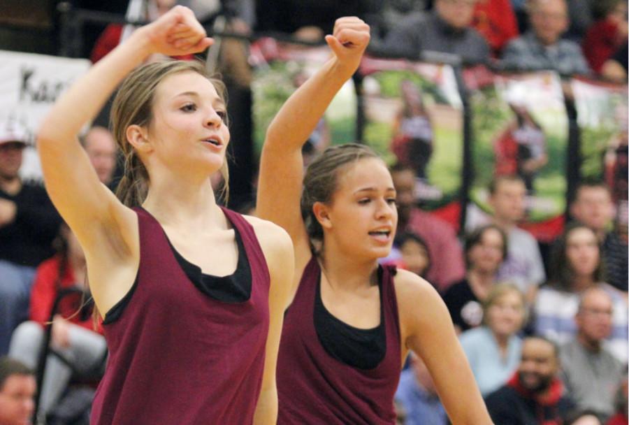 Haley Hobbs and Grace DiVibillis dance during halftime of the Lions game against Free State.