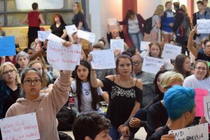 Students filled the rotunda Monday for a sit-in to support transgender students.
