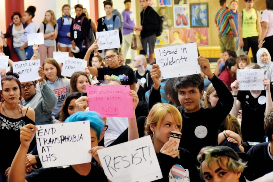 Demanding change — Students take part in a sit-in in the rotunda to support transgender students. The sit-in began during second hour on Sept. 18 and continued throughout the school day.