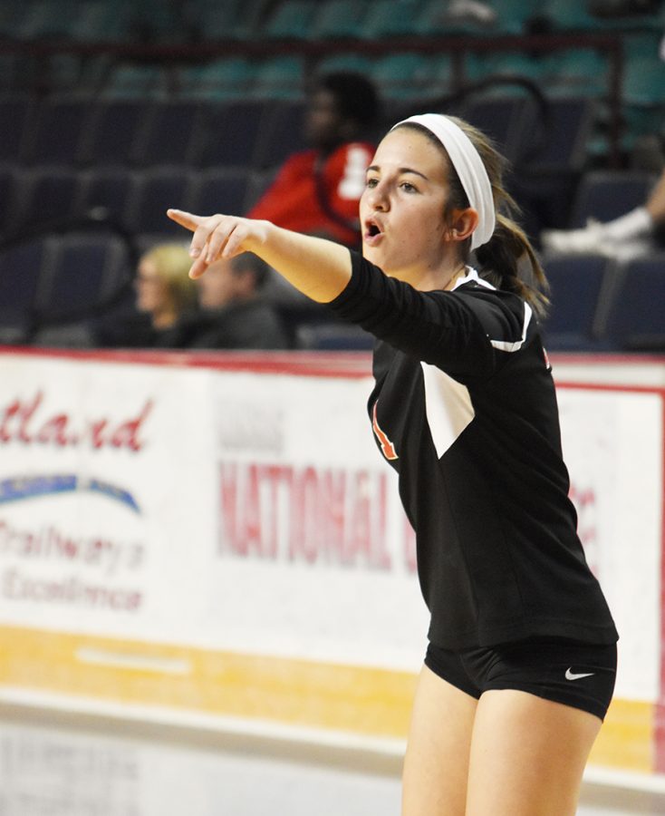 Junior Hannah Stewart directs her team during the 6A state volleyball tournament on Friday night in Topeka. The Lions made their first appearance in the state tournament since 2009.