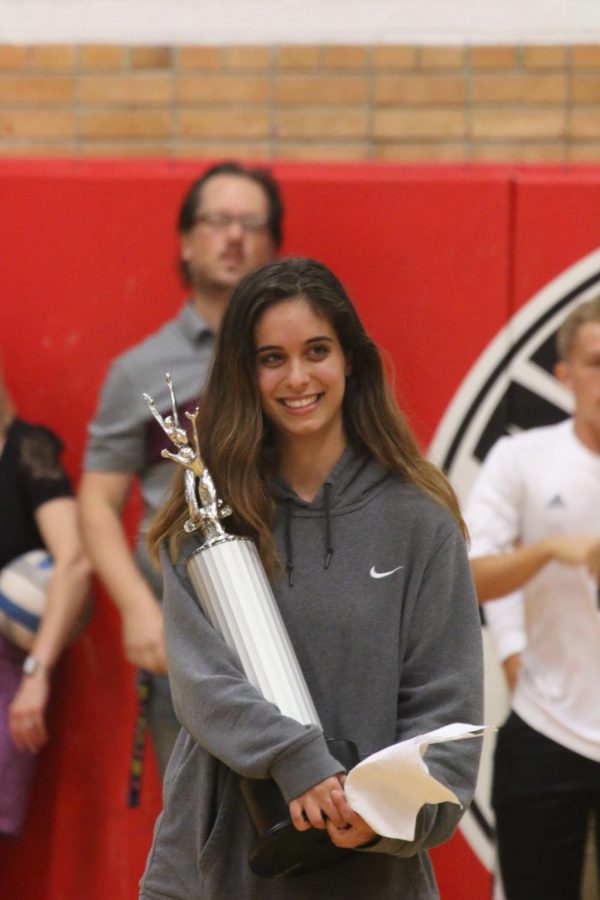 Vera Petrović, holding her first place trophy at the 2018 Fall Assembly