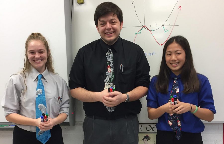 Anna Parnell, Matt Ellis and Emily Guo pose for a picture on Teacher Twin Day, September 25. Parnell and Guo are responsible for creating the Twitter account for Mr. Ellis. Photo courtesy of Anna Parnell.