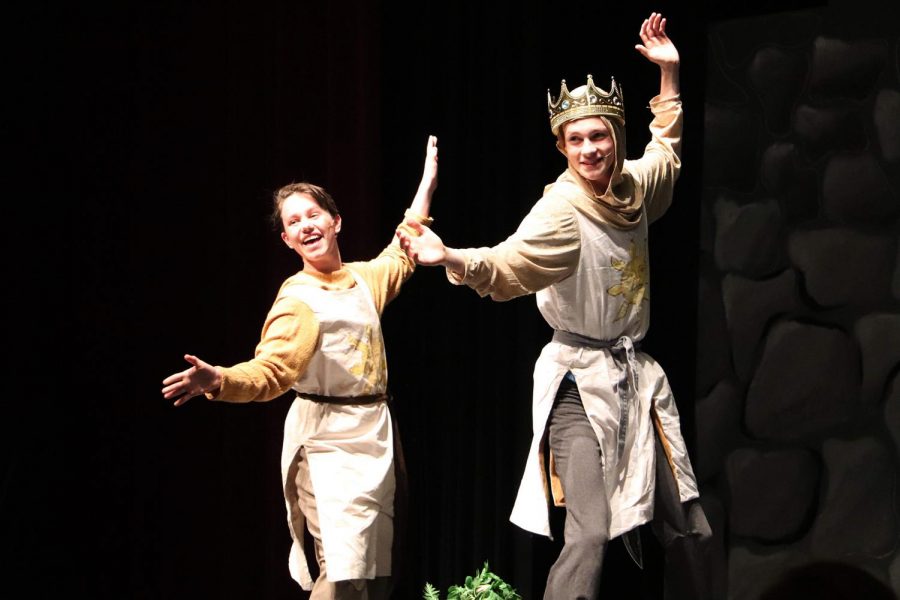 Grinning, senior Julian Weslander and junior Jack Malin dance during the song Always Look on the Bright Side of Life, during the winter musical, Spamalot on Jan. 25. Malin played King Arthur and Weslander played Arthurs trusty servant. The two travelled far and wide in search of the Holy Grail for two almost sold-out nights, making Spamalot the highest attended musical in five years.