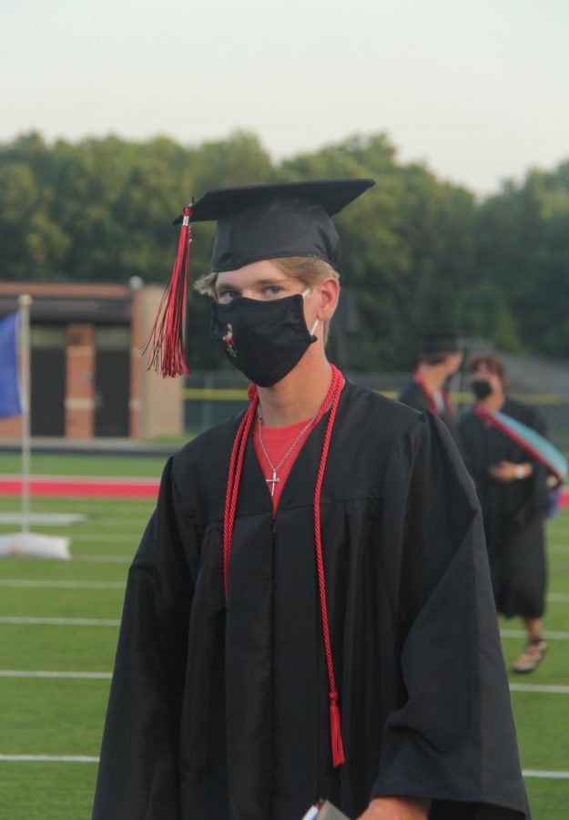 After a nearly two-month delay, Lawrence High seniors graduated on Saturday night. Participants were told to wear masks and stay distant as COVID-19 cases have been rising rapidly in Douglas County and the state overall. The stands remained clear. Instead graduates and their guests walked through the event at tiered times.