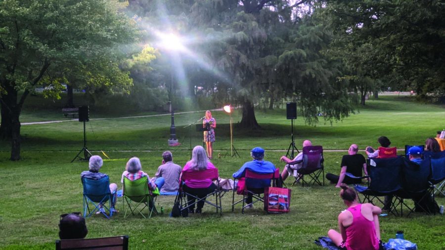 Sharing her work, teacher Melissa Johnson holds a poetry reading at Watson Park in association with The Raven Book Store. “I was nervous,” Johnson said. “Even though I have done a lot of readings, I am nervous every time,” Johnson said. 