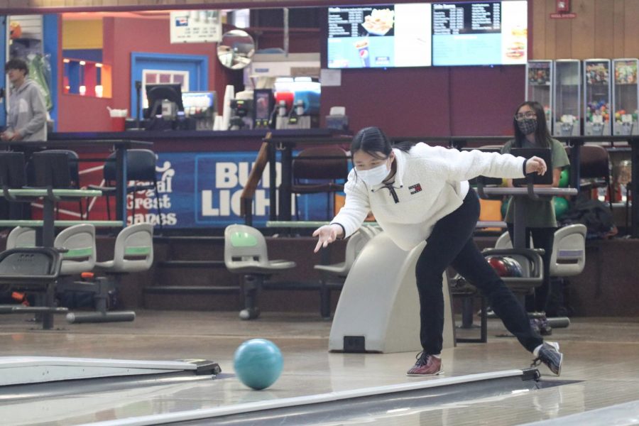 Rolling down the lane, senior Ci Ci Huang participates in the last Unified Bowling team practice before state. “I loved the Unified Bowling season,” Huang said. “It made me feel really encouraged and welcomed in the school.” The team took 15th at state. 