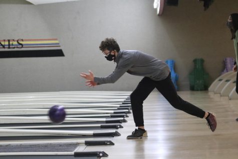 With power, junior Treven Gill bowls during a team practice on Nov. 4 at Royal Crest Lanes. 
