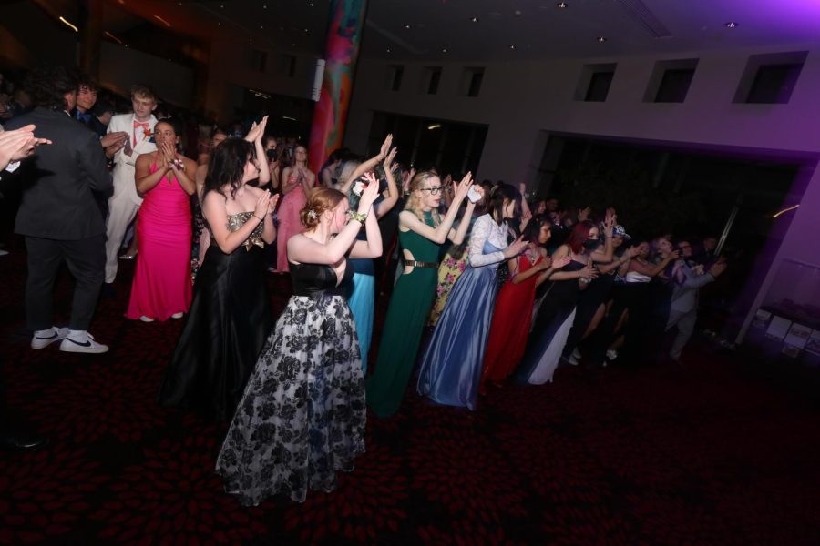 Prom night sees students dancing amid spring thunderstorms