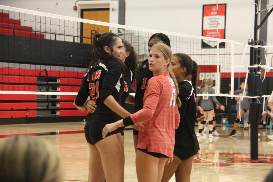 The volleyball team briefly amid a match against Blue Valley Northwest, played on August 30, in which the Lions fell 3-0.