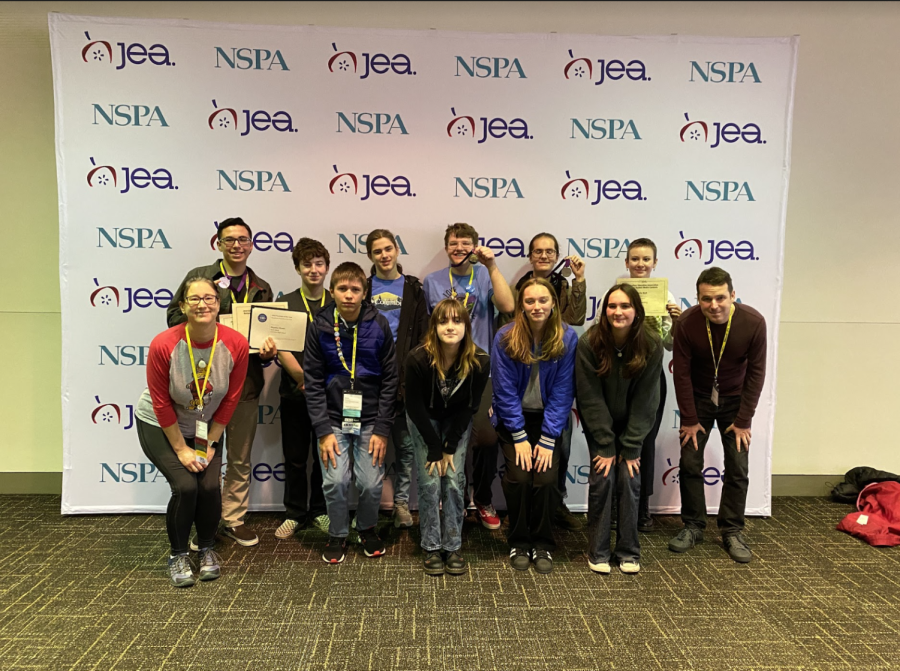 The+LHS+journalism+staff+show+off+their+awards+from+JEA+and+NSPA+at+the+National+High+School+Journalism+Convention+in+November+in+St.+Louis.+