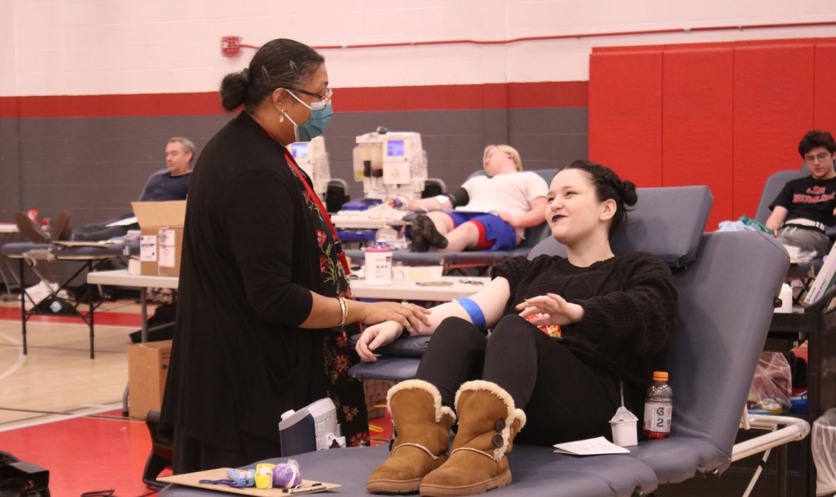 Junior Lucy Devers prepares to donate blood at the Blood Drive on Nov. 7. 