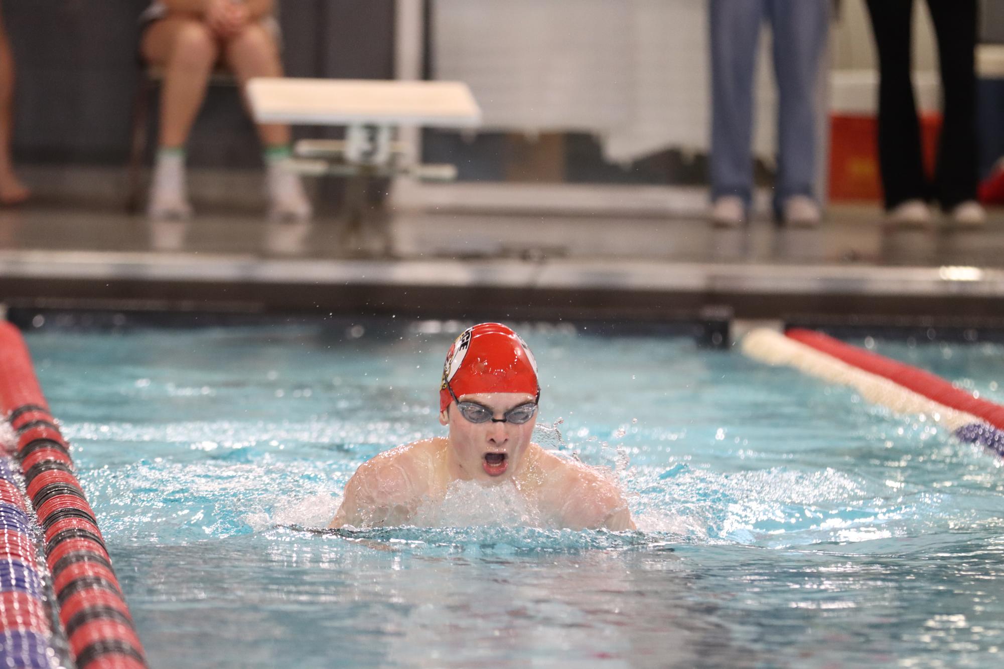 Senior Jack Tell swims the 200 individual medley at the home meet on January 18. 