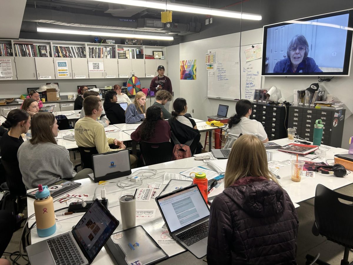 Mary Beth Tinker meets with journalism students on   April 3. She offered encouragement to students who had worn armbands in protest of AI monitoring of journalism work. A student in the 1960s, Tinker had been suspended for wearing a black armband to school — a case that later established free speech protections for students in public schools.