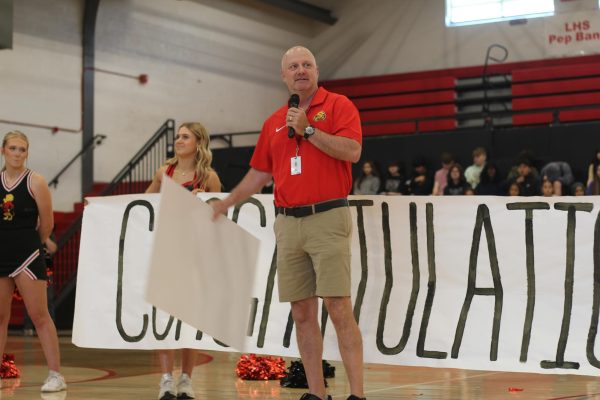 Coach Brad Stoll surprised with packed gym for Bobs Award win