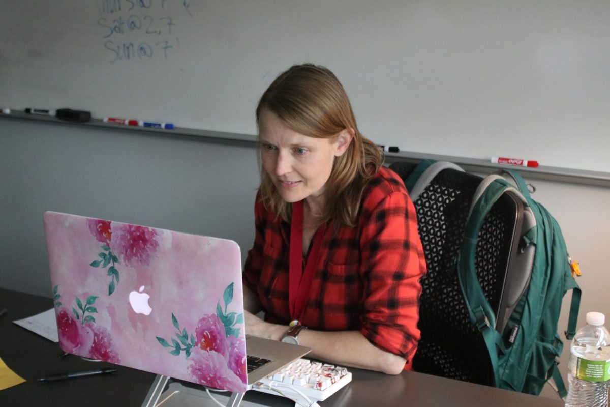 Johnson works in her original room during a break in classes.