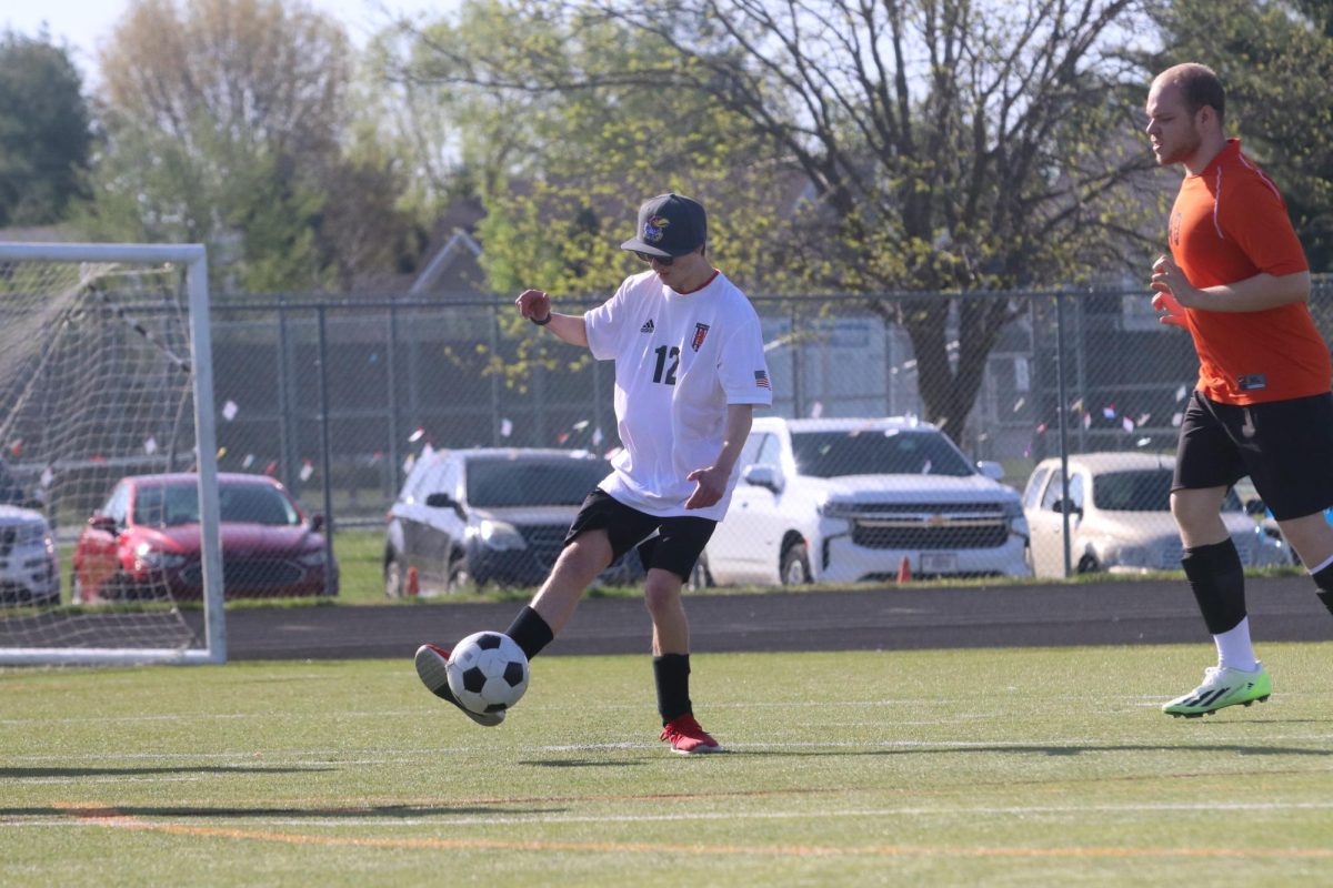 LHS and Unified alum Treven Gill passes the ball during the tournament on April 13. 