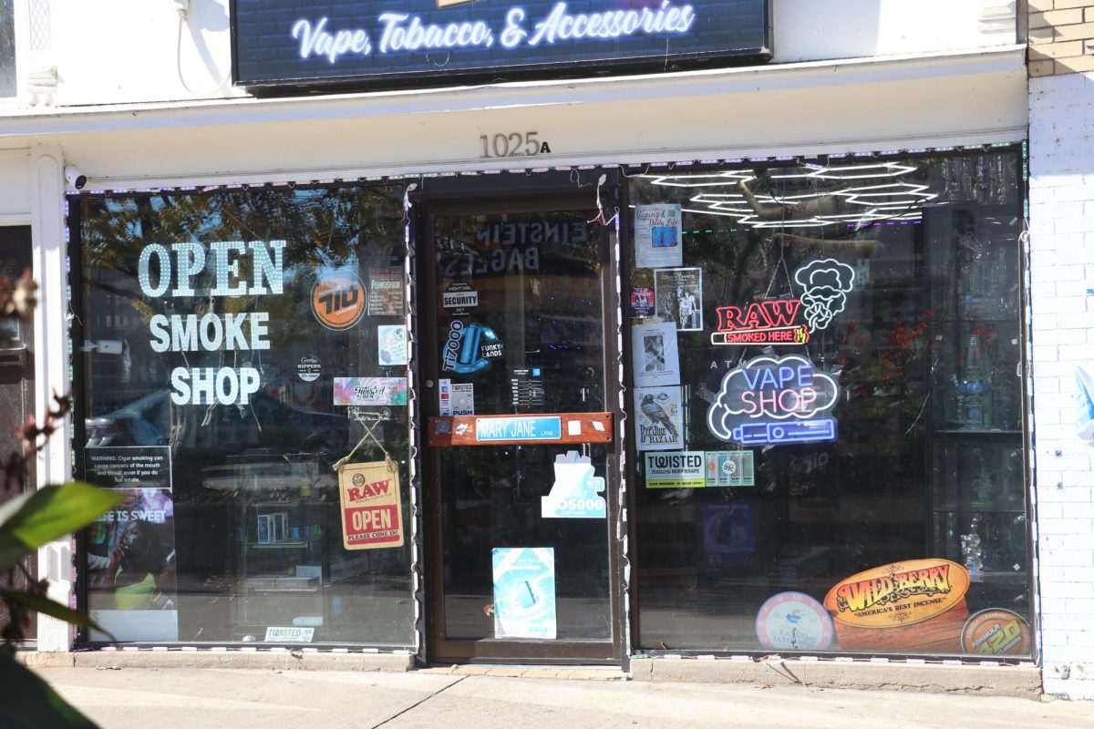 Hollywood 22 smoke shop on Mass. St. appeals to a younger audience with bright signs and colorful lighting. 